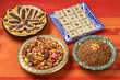 Traditional Moroccan dishes with Ashura, chocolate cookies and sellou on a table 