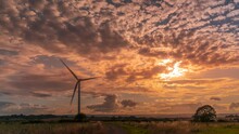 Time Lapse Of Wind Turbines And Sunset Through Moving Clouds Near Sheffield, South Yorkshire