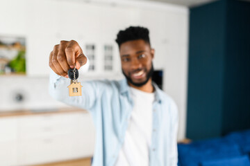 African American man holding new house keys