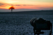 Taking pictures of the sunset with the camera in winter.