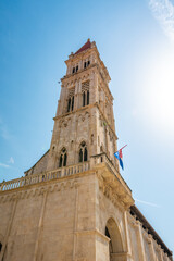 Wall Mural - View of cathedral of St Lawrence, Trogir - Croatia. Down to up look to beautiful ancient church tower.