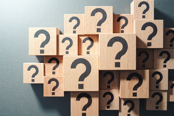 Aufkleber - Many question arising concept. Trouble and confusion. Top view of many wood cubes with question marks.