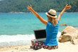 © Kostia - girl with laptop by the sea