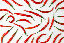 Hot Red Chili Isolated On Paper Background.