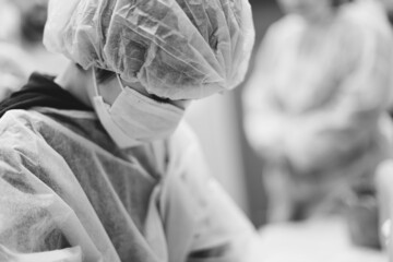 Canvas Print - doctor in the operating room. black and white photo