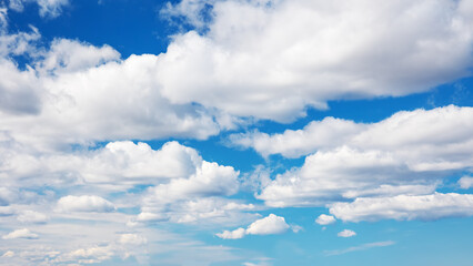 Wall Mural - Blue sky with soft white clouds in sunny day