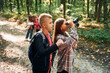 © standret - Conception of hiking. Kids in green forest at summer daytime together