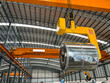 © ekkaluck - lifting master steel coils for move inside warehouse