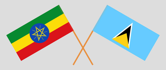 Crossed flags of Ethiopia and Saint Lucia. Official colors. Correct proportion