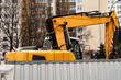 Construction Site in the City. Construction Equipment. Heavy Machines. Digger. Excavator