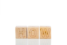 Wooden Cubes With Letters How On A White Background
