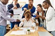 © Krakenimages.com - Group of business workers screaming to stressed partner at the office.