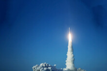 Take Off Space Rocket On A Background Of Blue Sky And Sun. Elements Of This Image Were Furnished By NASA