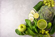 Healthy detox smoothie with cucumber, broccoli, green apple, kale and green grapes. Detox drink.