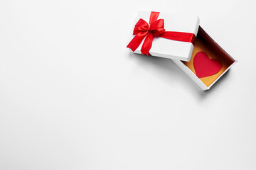 Canvas Print - Heart and gift box with a white background