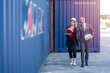 © Quality Stock Arts - Business man working with women team or secretary in port cargo logistics industry