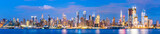 Fototapeta Miasta -  new york city skyline  at night with reflection in hudson river.