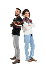 Sticker - Happy young couple in warm sweaters on white background