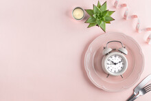 Diet Concept. Composition With Cutlery, Measuring Tape And Alarm Clock On Color Background. Copy Space