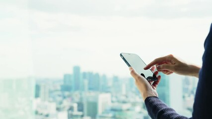Poster - People using a smart phone in front of the city.