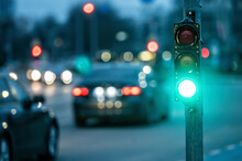Traffic Light On The Street Junction With Beautiful Bokeh, City With Cars In The Background