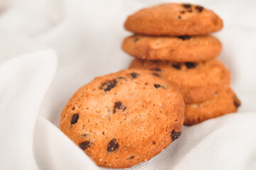 sweet crunchy cookies with dark chocolate for teatime