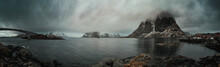 Norwegian Fjords In Spring And Mountains At Low Clouds Panorama