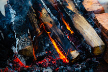 Close-up Firewood, Hot Coals And Ash. Lighting Barbecue Coals.