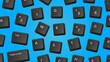 Scattered keyboard keys on bright blue background