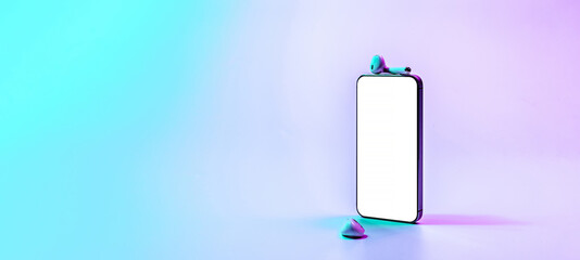 Screen mockup. Mobile smartphone technology blank screen. Mock up smart phone device, audio headphones on neon gradient banner. Game design, mobile application presentation or portfolio mockups.