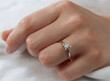 © kamil - Jewelry background. Diamond ring on woman hand