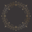 © Murhena - Vector mystic celestial round golden outline frame with different stars, beams and a copy space. Ornate shiny magical linear border with a place for text