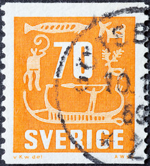 Wall Mural - Sweden - circa 1957: a postage stamp from Sweden showing prehistoric rock carvings