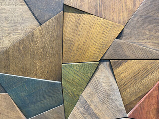 Vintage parquet floor with triangle pattern. Wood texture background. Weathered seamless wooden wall