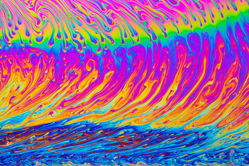 Wall Mural - psychedelic multicolored background abstract. rainbow colors. patterns background. photo macro shot 