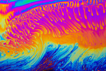 Wall Mural - psychedelic multicolored background abstract. rainbow colors. patterns background. photo macro shot 