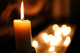Fototapeta  - Una vela para iluminar el espíritu. Fotografía realizada en una iglesia de Irlanda. 