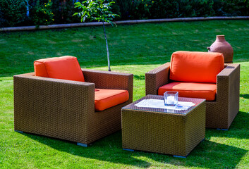 Canvas Print - old chairs at a backyard