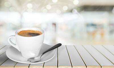 Canvas Print - Sweet hot coffee on the table for a blur background