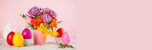 Easter Card. Colorful Easter Eggs On The Background Of A Bouquet Of Flowers. Copy Space.
