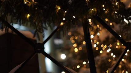 Poster - Christmas decoration of the house outside spruce branches with garlands