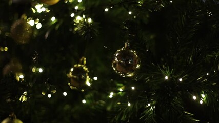 Poster - Christmas tree with gold balls close-up