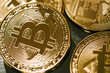 © Kuzmaphoto - Bitcoins in closeup ,selective focus