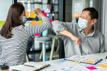 Poster - Business team is shaking with elbow bump in new normal concept to greeting when meeting to brainstorming