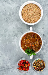 Wall Mural - Vegetable soup with lentils in white plate. Studio Photo