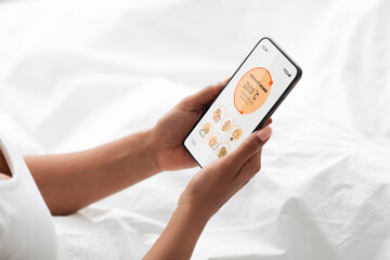 Poster - Woman regulating room temperature via smart home, using smartphone