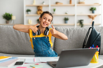 Poster - Girl sitting at desk, using pc, showing thumbs up