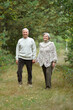 © aletia2011 - Portrait of happy senior couple posing in autumn forest