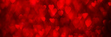 Red Hearts, Sparkling Glitter Bokeh Background Texture. Holiday Valentines Day Lights. Abstract Defocused Header. Wide Screen Wallpaper. Panoramic Web Banner With Copy Space For Design
