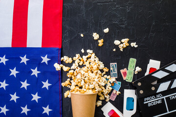 Movie clapper board USA flag, 3d movie cinema glasses and popcorn.  Cinema industry, entertainment